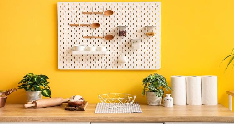 yellow kitchen with pegboard