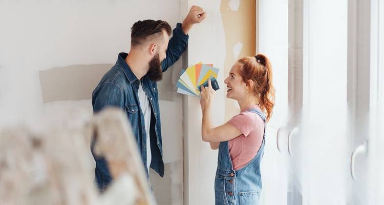 couple with paint swatches