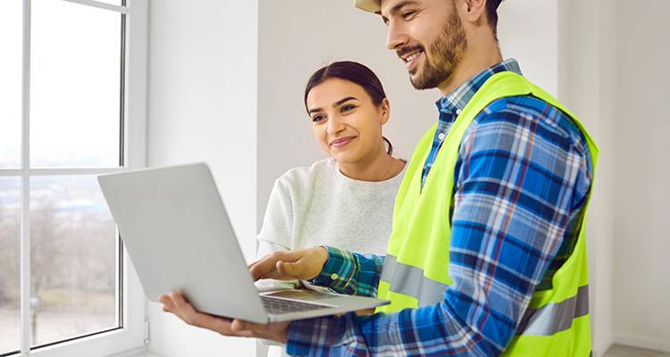 woman talking to tradesman