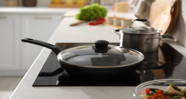 pans on hob with lids on