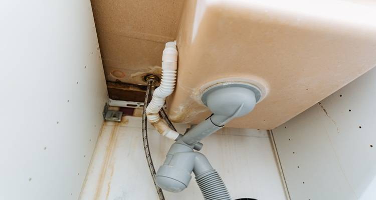 leak under kitchen sink