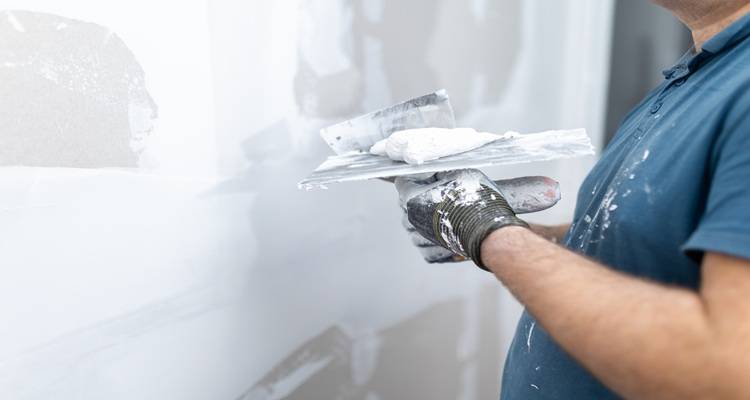 hand trowel white plaster