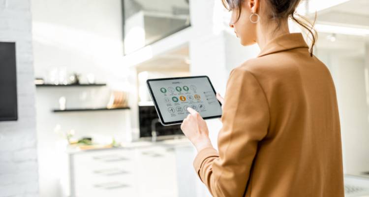 woman holding smart home hub