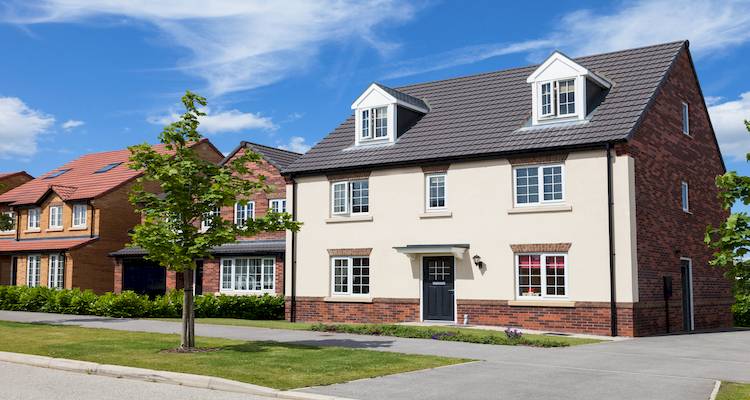 street view of detached houses on a new housing development