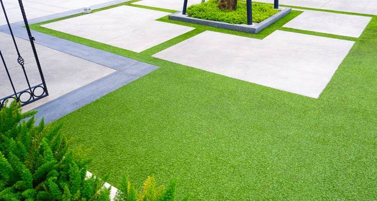 fake grass centre OF GARDEN slabs