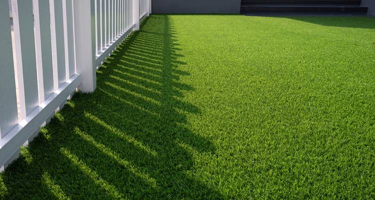 fake grass white fencing