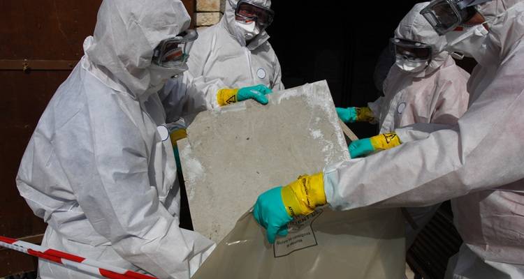 people with asbestos suits on