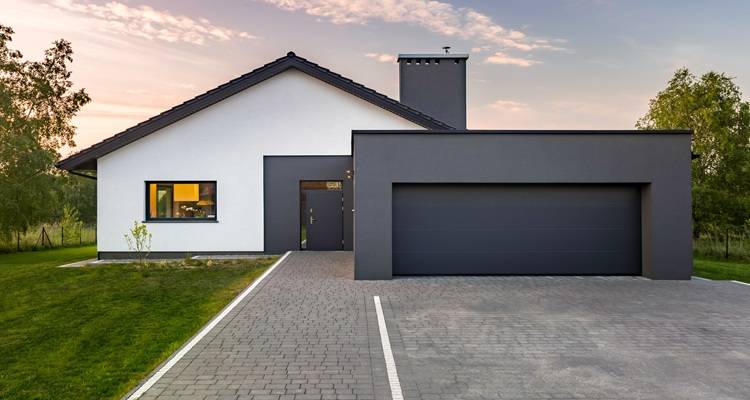 modern bungalow garage driveway cobbles