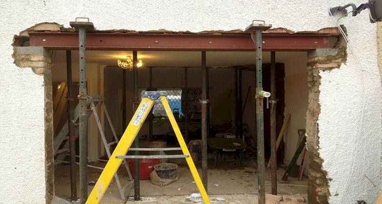 wall of a building after bifold doors have been removed