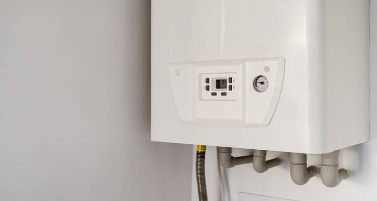 white boiler against wall