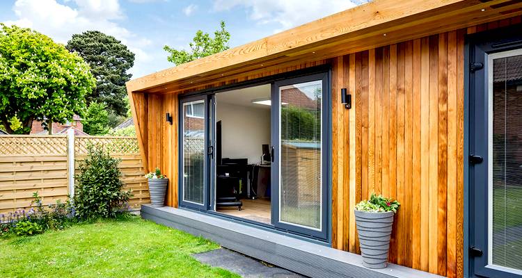 wooden outbuilding with flat roof