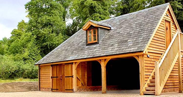 wooden outbuilding construction costs