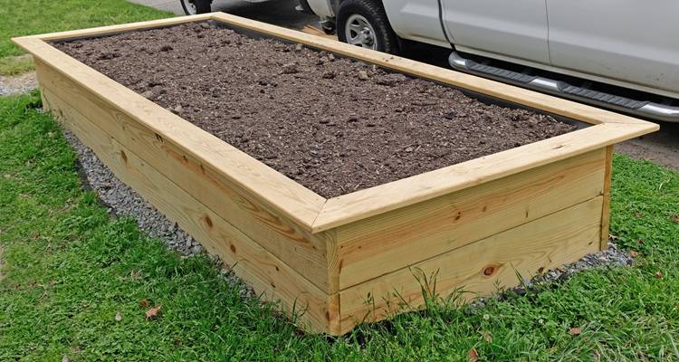 raised bed in front of truck