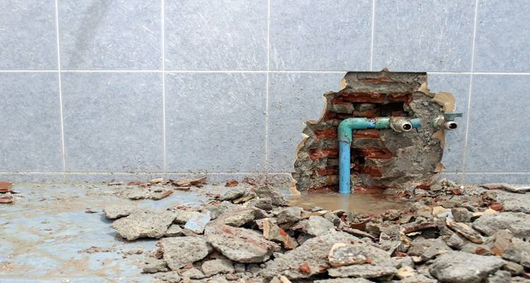hole in wall burst pipes