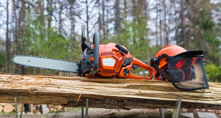 chainsaw and helmet