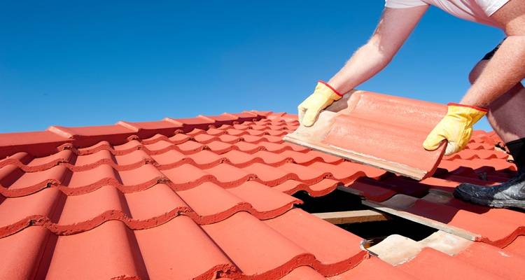 roof tile being replaced
