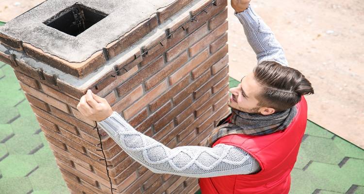 chimney man red vest