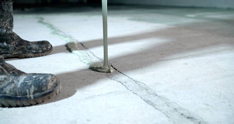 concrete crack being filled