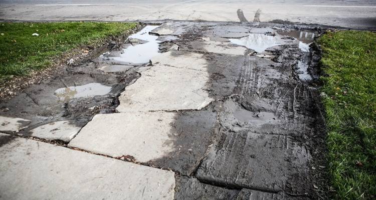 cracked and broken driveway