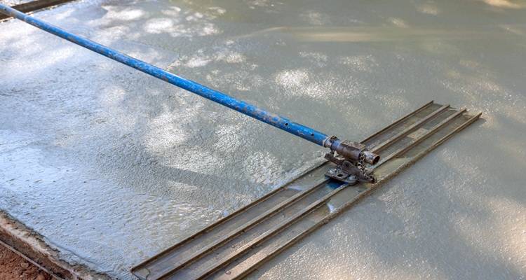 concrete being tamped