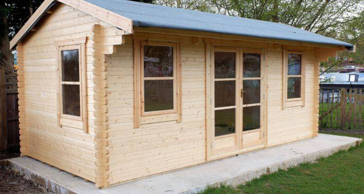 wooden shed on concrete slab shed base