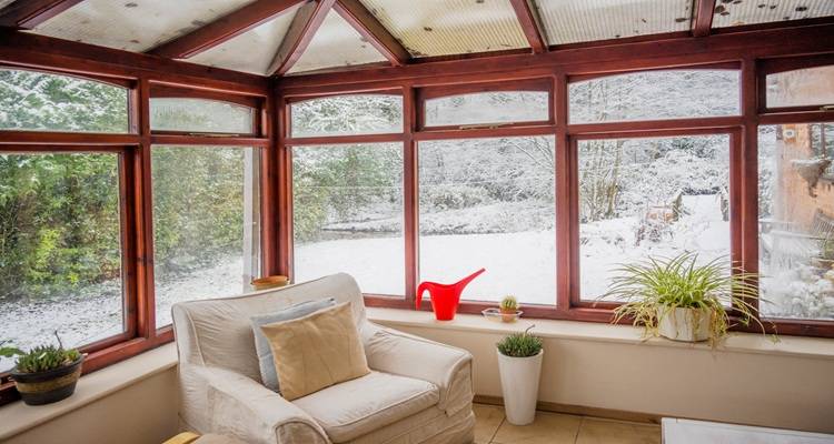 conservatory in winter snow