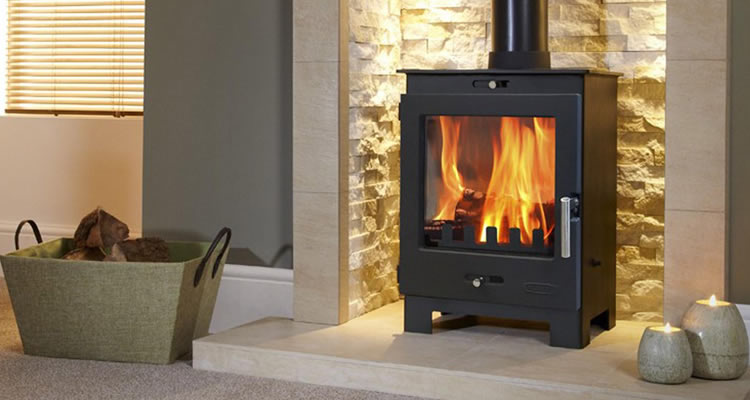 modern-style log burner installed in a UK home