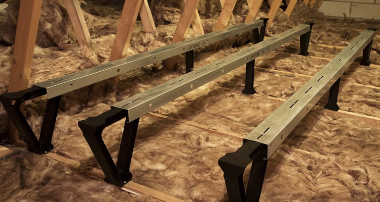 example of loft legs installed in an attic before boards are added