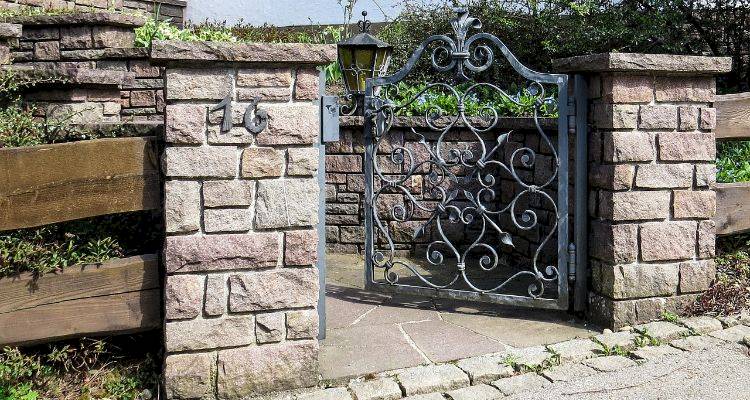 brick garden wall with gate