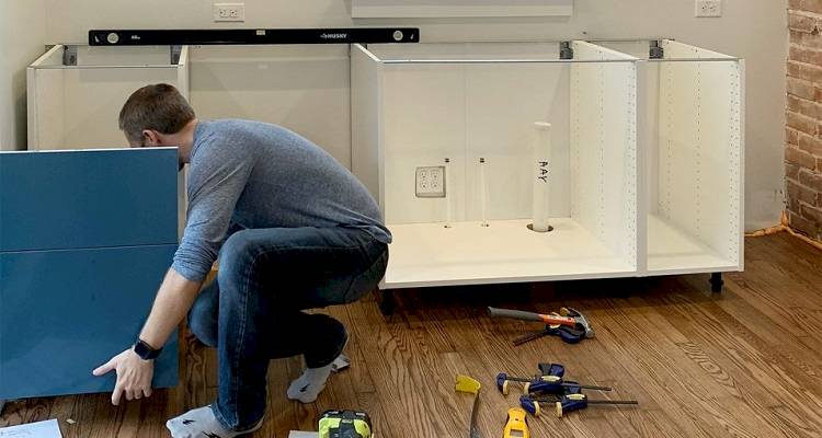 person in the process of remodelling a kitchen