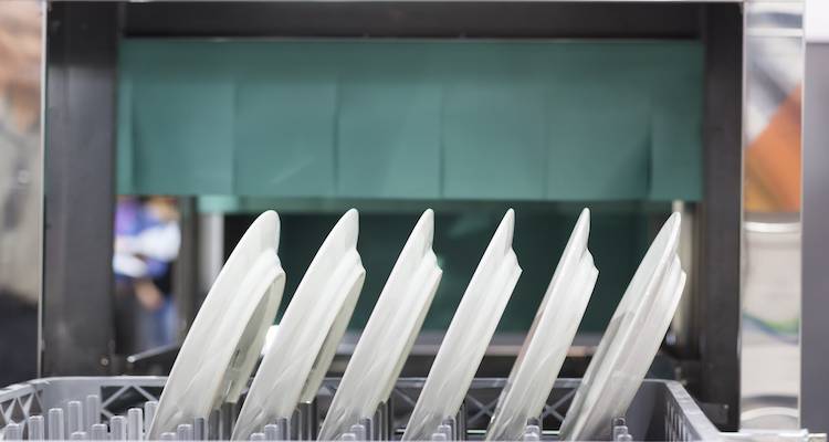 closeup of a commercial dishwasher