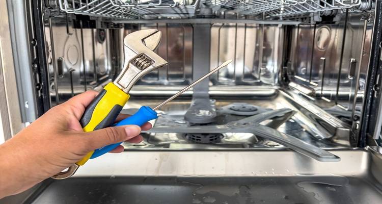 tools in front of dishwasher