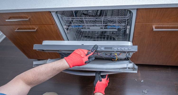 man front of dishwasher off