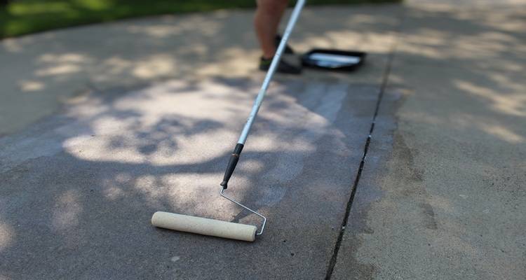 close up driveway being sealed