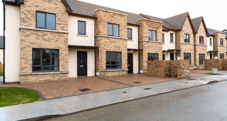 new build houses with a dropped kerb in front of their driveways
