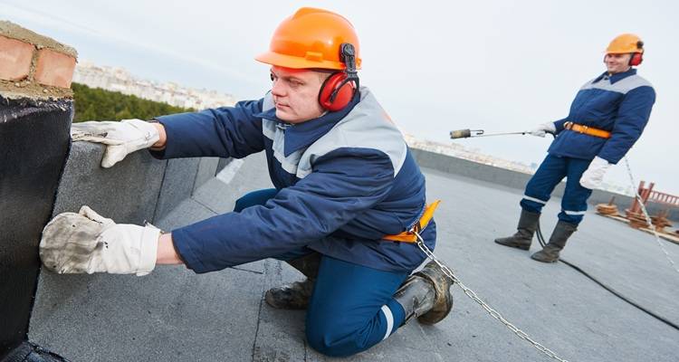 men fitting roof