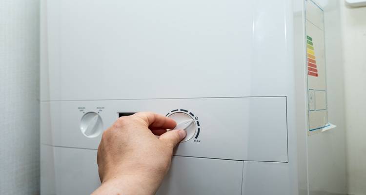 Hand on boiler