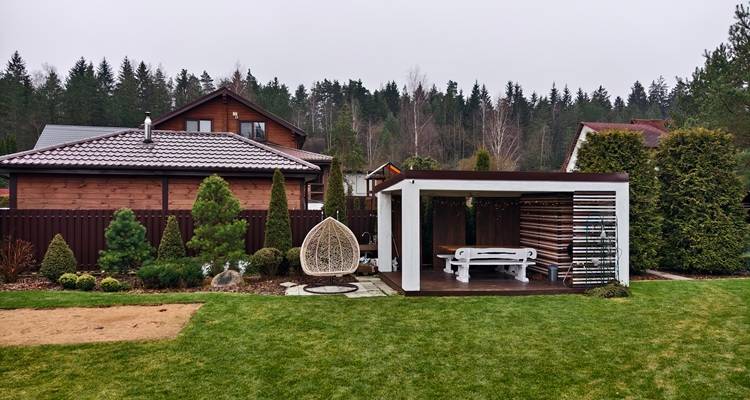 gazebo back garden pine trees back ground