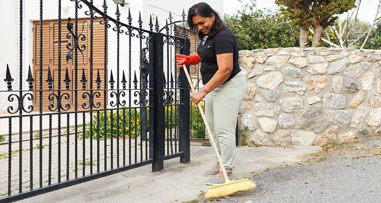 woman sweeping