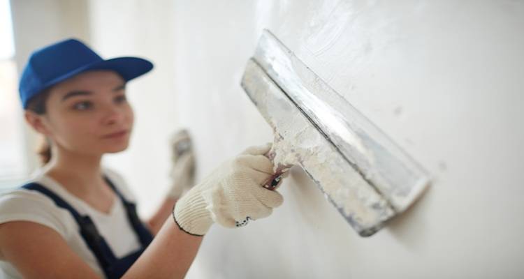 woman plastering