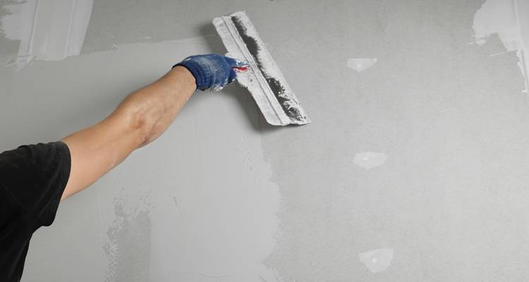 arm plastering three grey bits
