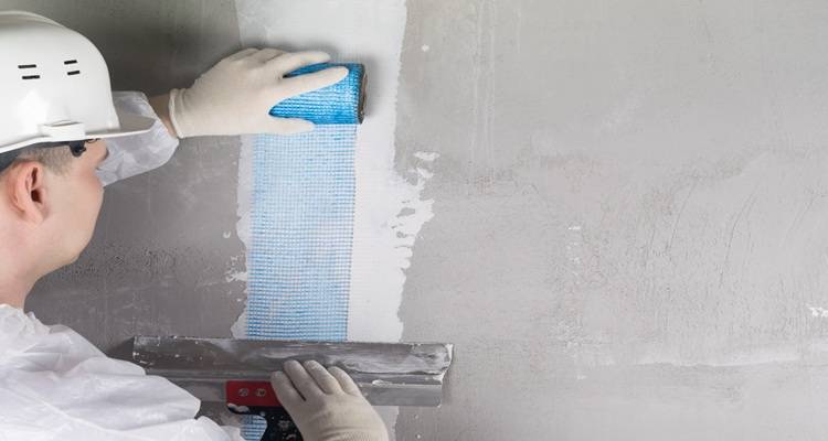 man plastering