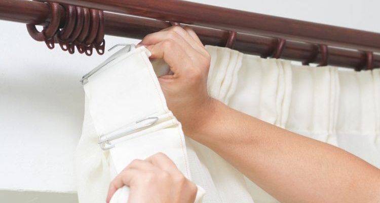 curtain fitter installing track