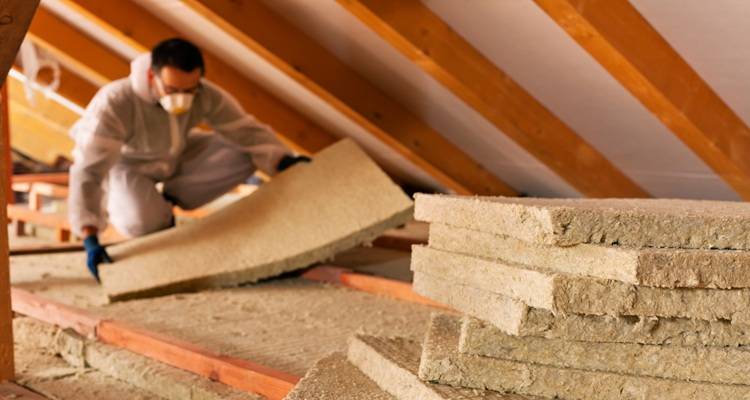 loft insulation being installed