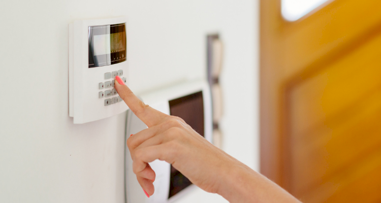 person configuring an alarm system