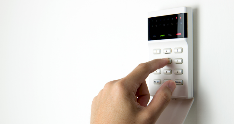 person configuring an alarm system