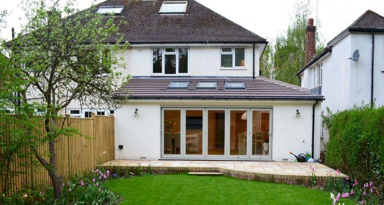 house extension cost guide &mdash; UK property with a wraparound extension