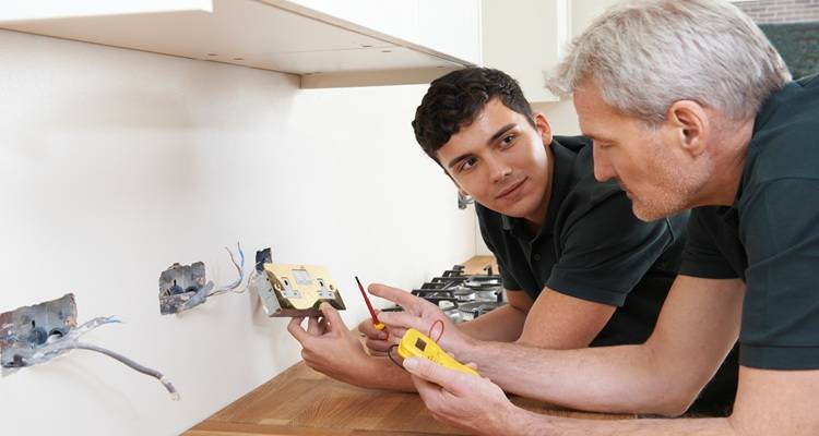 two men sockets wires