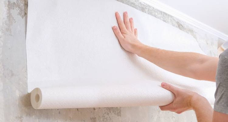 white paper being hung