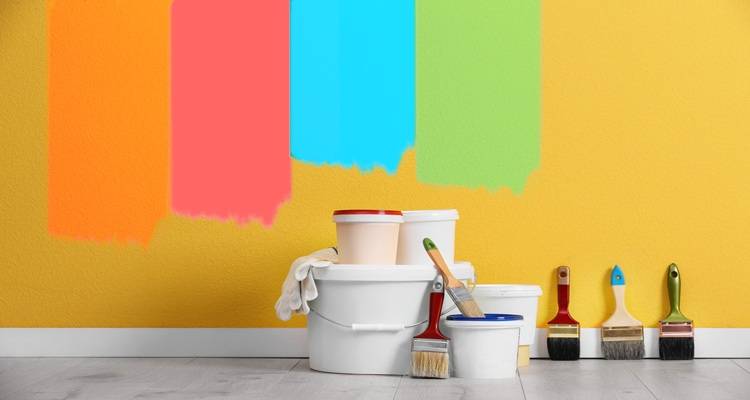 yellow wall paints brushes